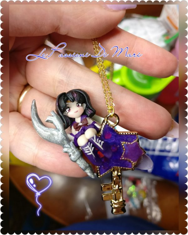 sailor Saturn Necklace sitting on a star charm bezel